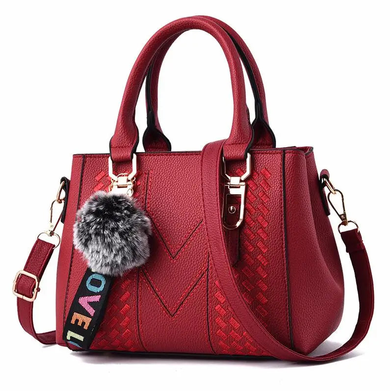 Chic Navy Blue Handbag with Detachable Shoulder Strap and Pom-Pom Charm Bags Women Leather Handbags Bags for Women.