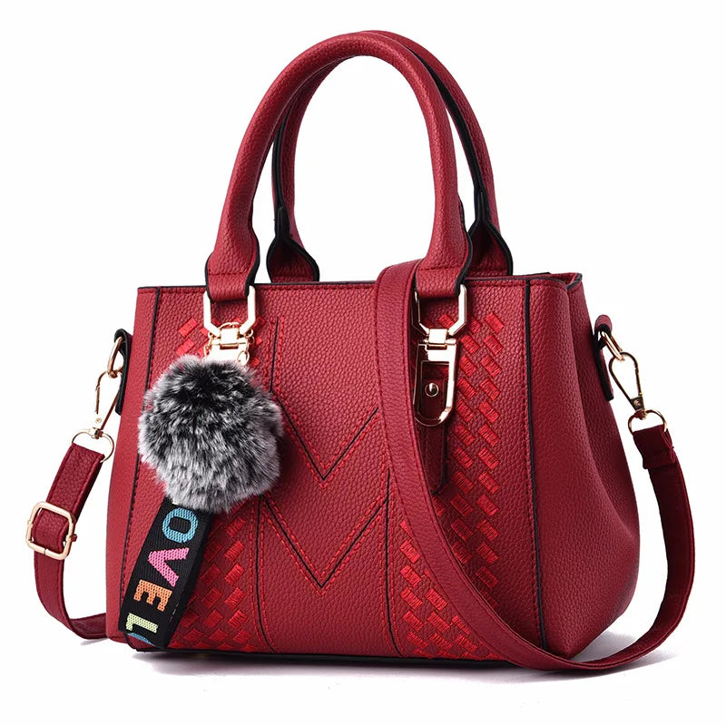 Chic Navy Blue Handbag with Detachable Shoulder Strap and Pom-Pom Charm Bags Women Leather Handbags Bags for Women.