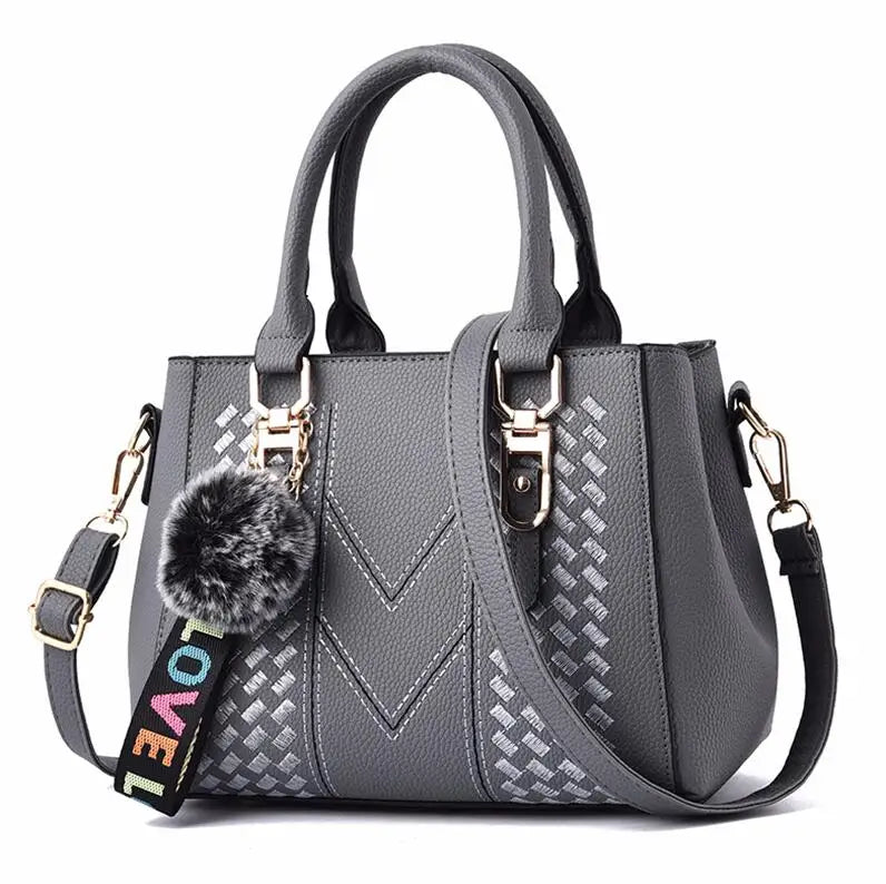 Chic Navy Blue Handbag with Detachable Shoulder Strap and Pom-Pom Charm Bags Women Leather Handbags Bags for Women.