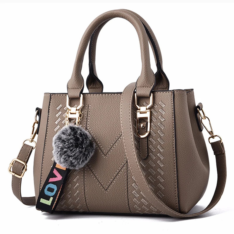 Chic Navy Blue Handbag with Detachable Shoulder Strap and Pom-Pom Charm Bags Women Leather Handbags Bags for Women.
