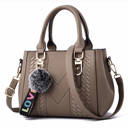 Chic Navy Blue Handbag with Detachable Shoulder Strap and Pom-Pom Charm Bags Women Leather Handbags Bags for Women.