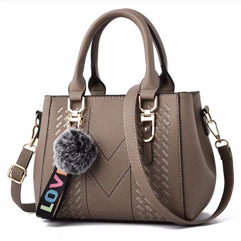 Chic Navy Blue Handbag with Detachable Shoulder Strap and Pom-Pom Charm Bags Women Leather Handbags Bags for Women.